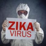 Man in Hazmat suite warning of Zika in the Mississippi gulf coast; Southern Pest Control
